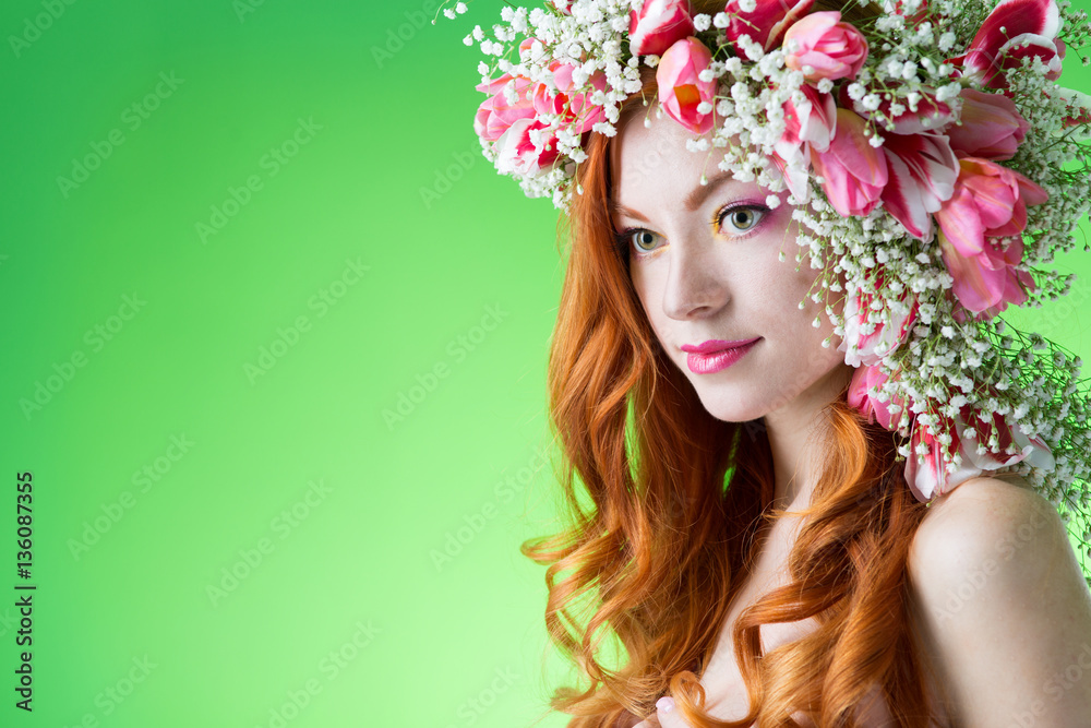 young woman in a wreath of tulips
