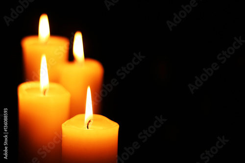 four candles left on stairs