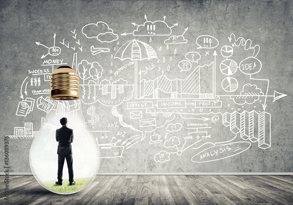 Businessman trapped in bulb Businessman trapped in bulb