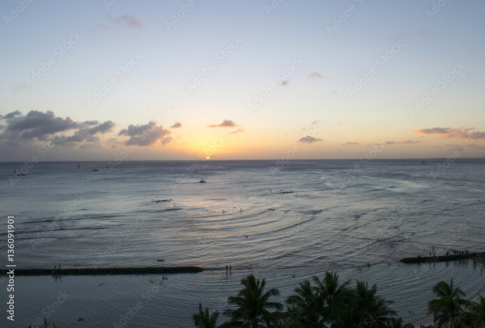 Sunset over the ocean in Oahu, Hawaii Sunset over the ocean in Oahu, Hawaii