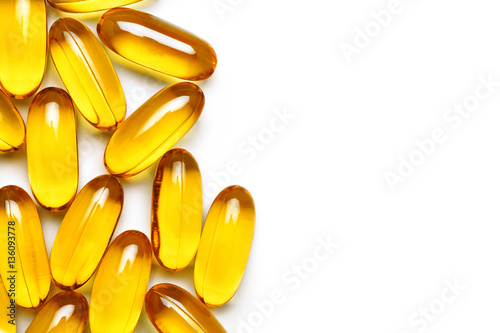 Close up of capsules Omega 3 on white background. Copy space for your text. Top view, high resolution product. Health care concept photo