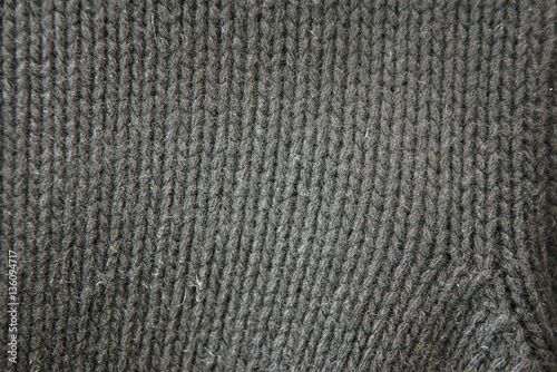 woolen fabric of dark color for the background
