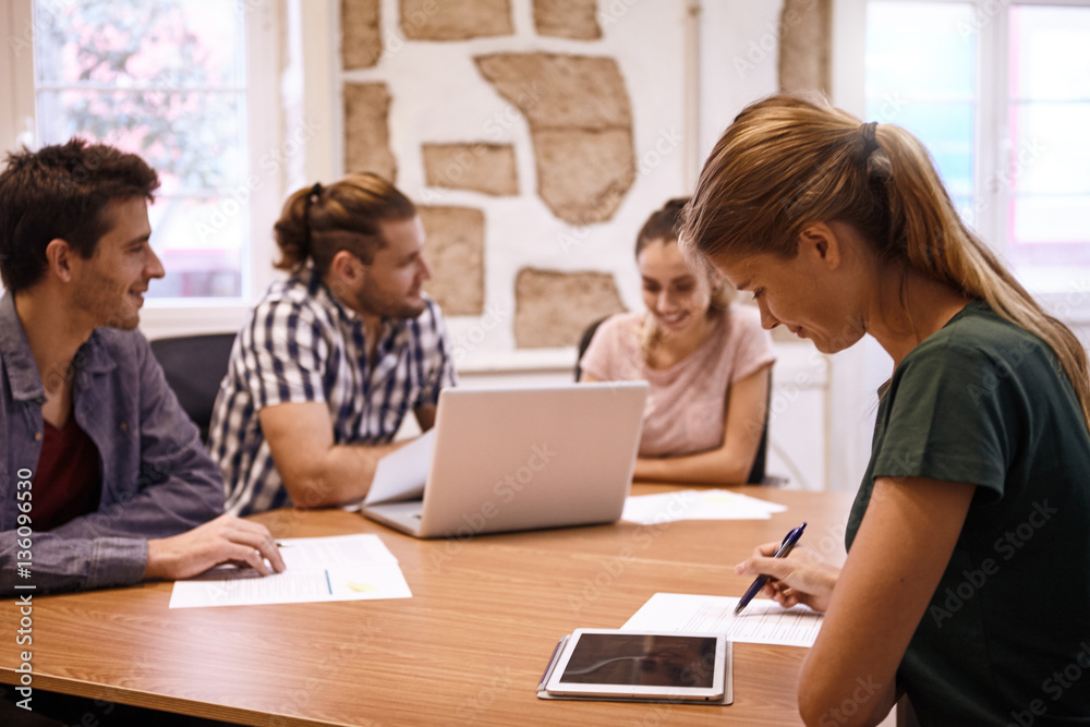 Young professional preparing herself for meeting Young professional preparing herself for meeting
