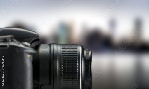 Φωτογραφία camera, photo camera, the camera against city background