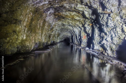 Flooded tunnel of an old abandoned coal mine 