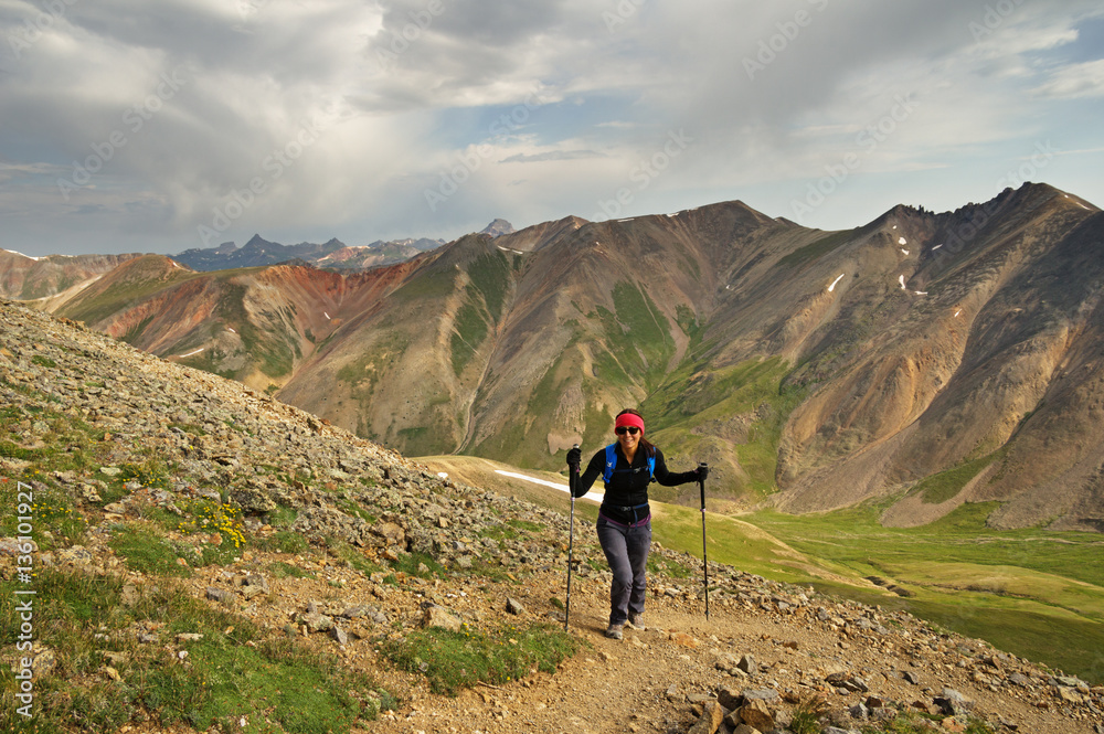 Woman Hiking In Mountains