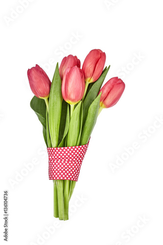 Fototapeta Naklejka Na Ścianę i Meble -  Bouquet of red tulips decorated with ribbon, isolated over white background 