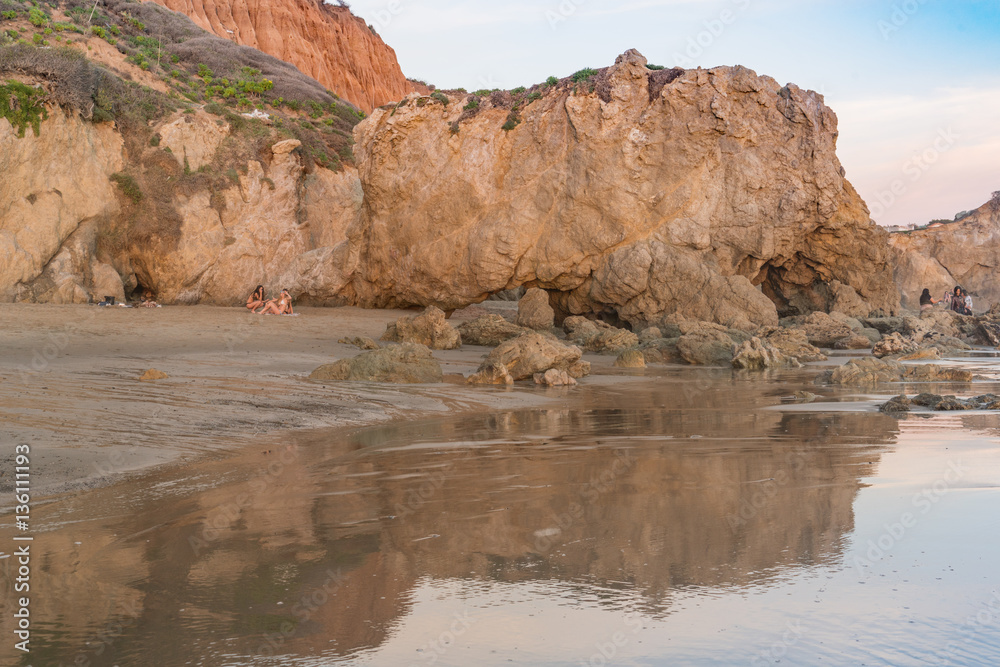 Late Afternoon sunlight bathes the rocks at El Matador State Beach near Malibu California