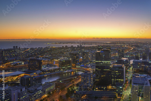 An aerial view of Melbourne cityscape at sunset