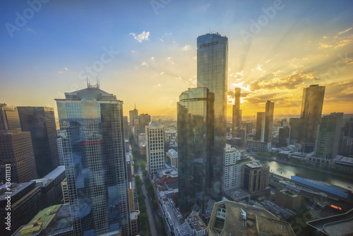 An aerial view of Melbourne cityscape at sunrise © mezairi