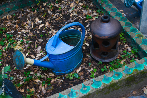 old watering can