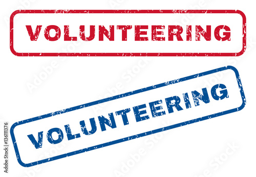 Volunteering text rubber seal stamp watermarks. Vector style is blue and red ink caption inside rounded rectangular shape. Grunge design and unclean texture. Blue and red emblems.