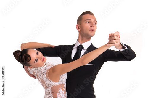 ballrom dance couple in a dance pose isolated on white bachground photo