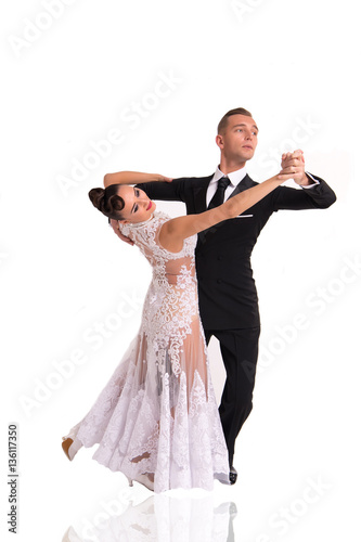 ballrom dance couple in a dance pose isolated on white bachground photo