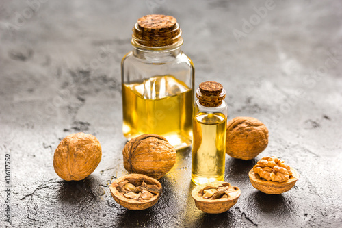 cosmetic and therapeutic walnut oil on dark background