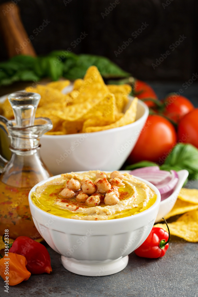 Homemade hummus in a white bowl Homemade hummus in a white bowl