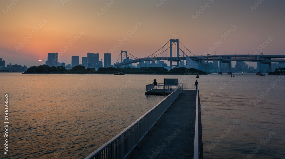 Rainbow Bridge seen from a jetty on Odaiba Tokyo Japan