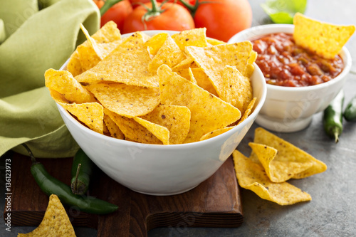 Corn tortilla chips in big bowl photo