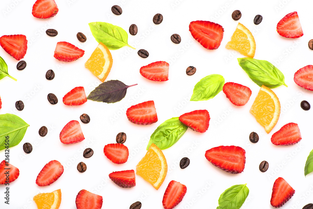 coffee beans, strawberry, orange, sheets of basil on white background coffee beans, strawberry, orange, sheets of basil on white background