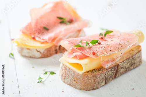 Crisp sandwich with ham and cheese for breakfast
