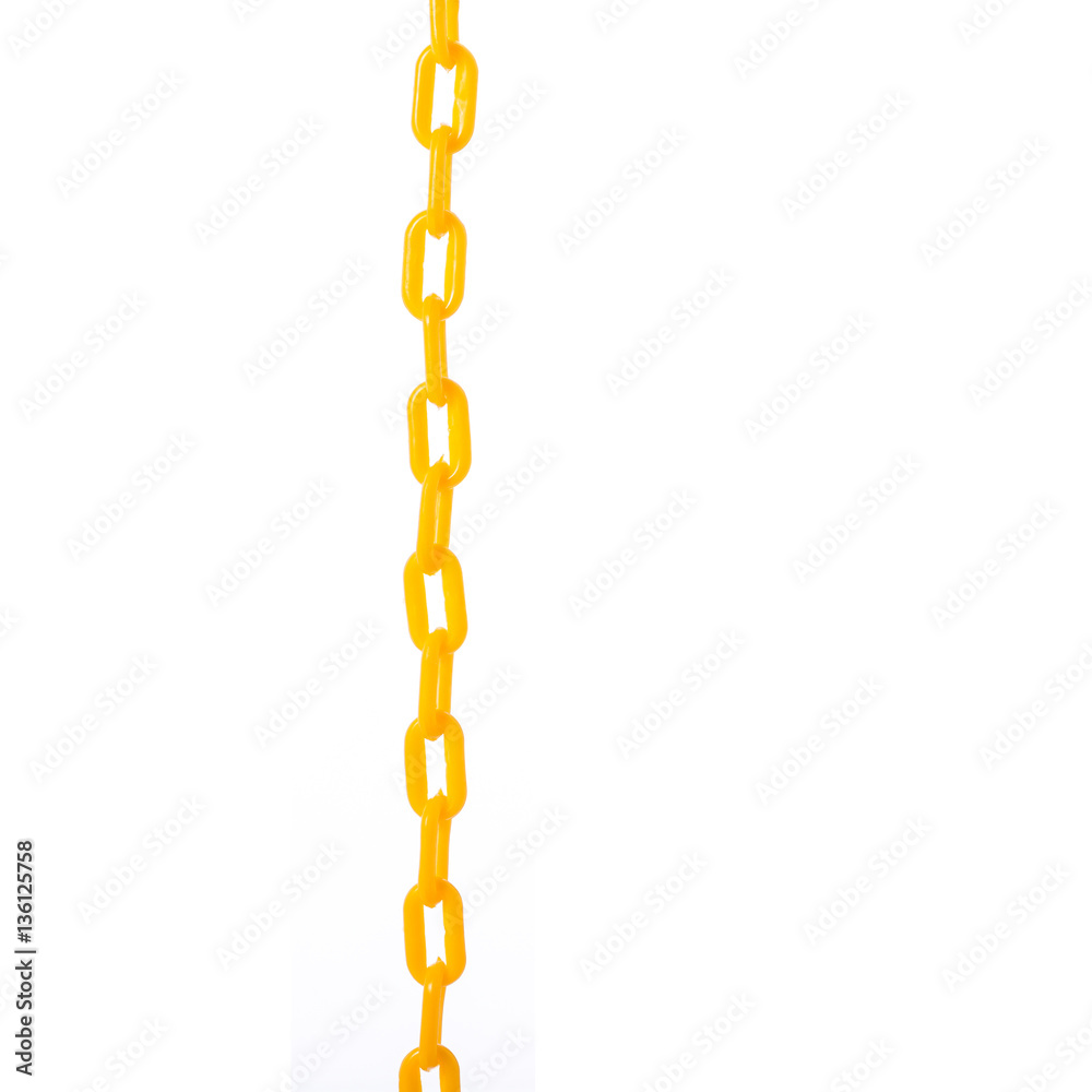 New yellow plastic chain. Studio shot isolated on white New yellow plastic chain. Studio shot isolated on white