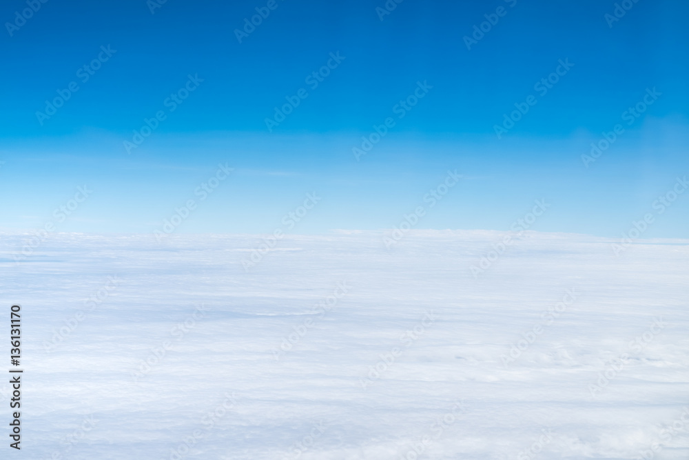 Blue sky and Cloud Top view from airplane window,Nature backgrou Blue sky and Cloud Top view from airplane window,Nature backgrou