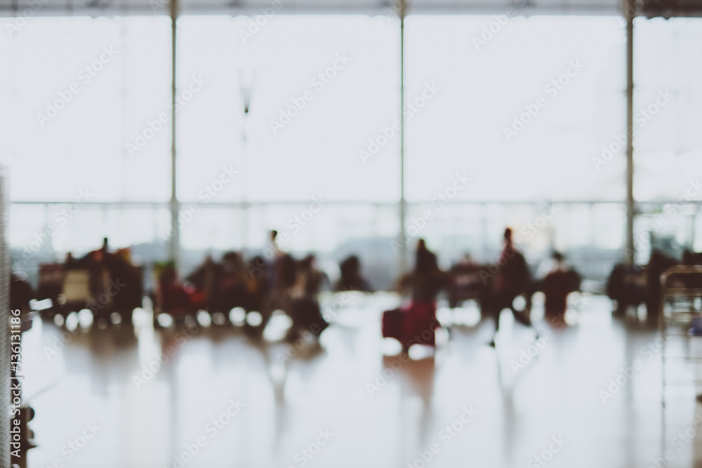 Obraz premium Blurred background,Traveler with baggage at Terminal Departure C