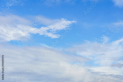 blue sky background with tiny clouds © olegmayorov
