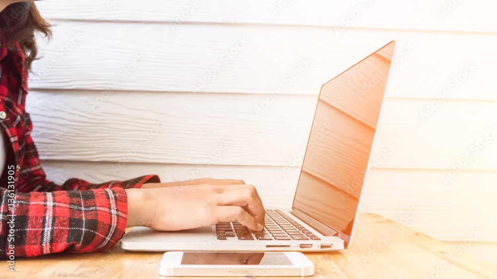 Fototapeta premium hand control on a laptop touchpad