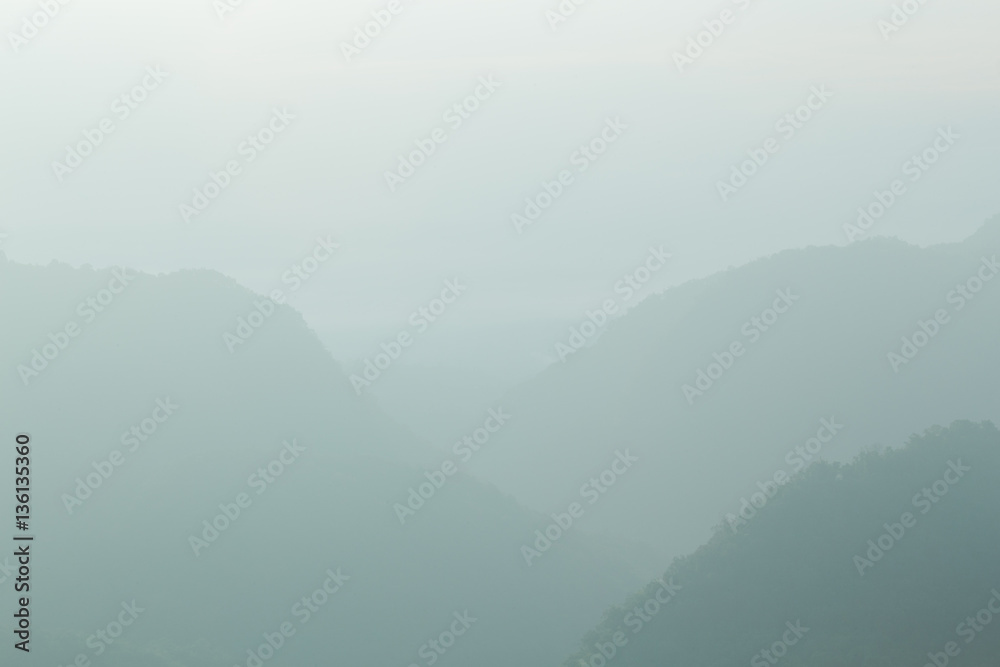 Landscape mountain and mist on morning mountain,soft light Backg