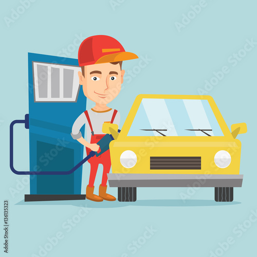 Worker filling up fuel into car at the gas station