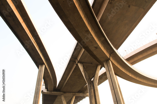 concrete bridge it is super highway across big river in city 