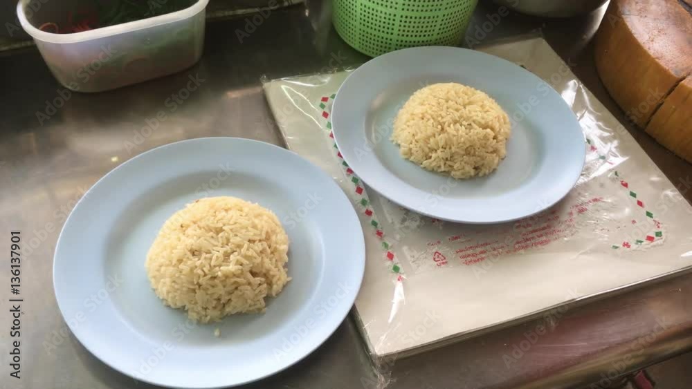 Woman Chef prepare Hainanese chicken rice for customer Woman Chef prepare Hainanese chicken rice for customer