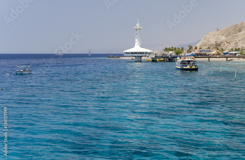 View on the coral reefs and underwater observatory near Eilat - famous resort city in Israel photo