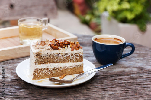 Coffee cake with almond and hot espresso