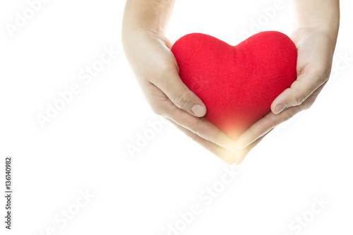 Hand holding red heart shape isolated