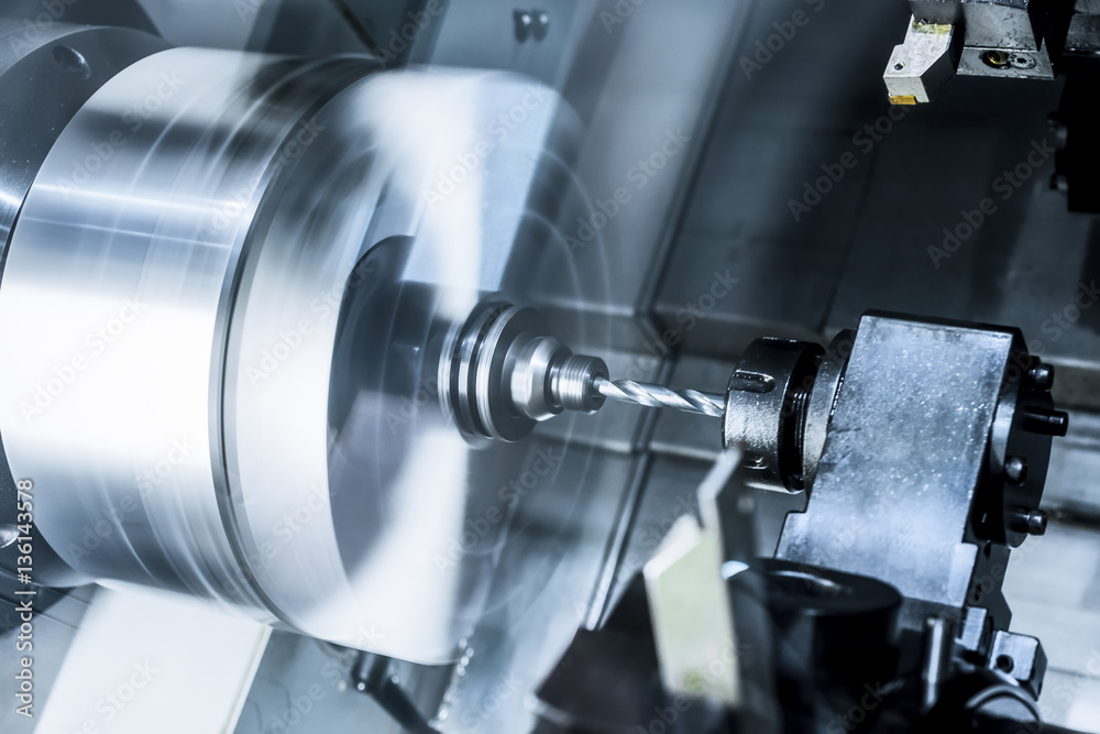 The rotating lathe spindle. The rotating lathe spindle.