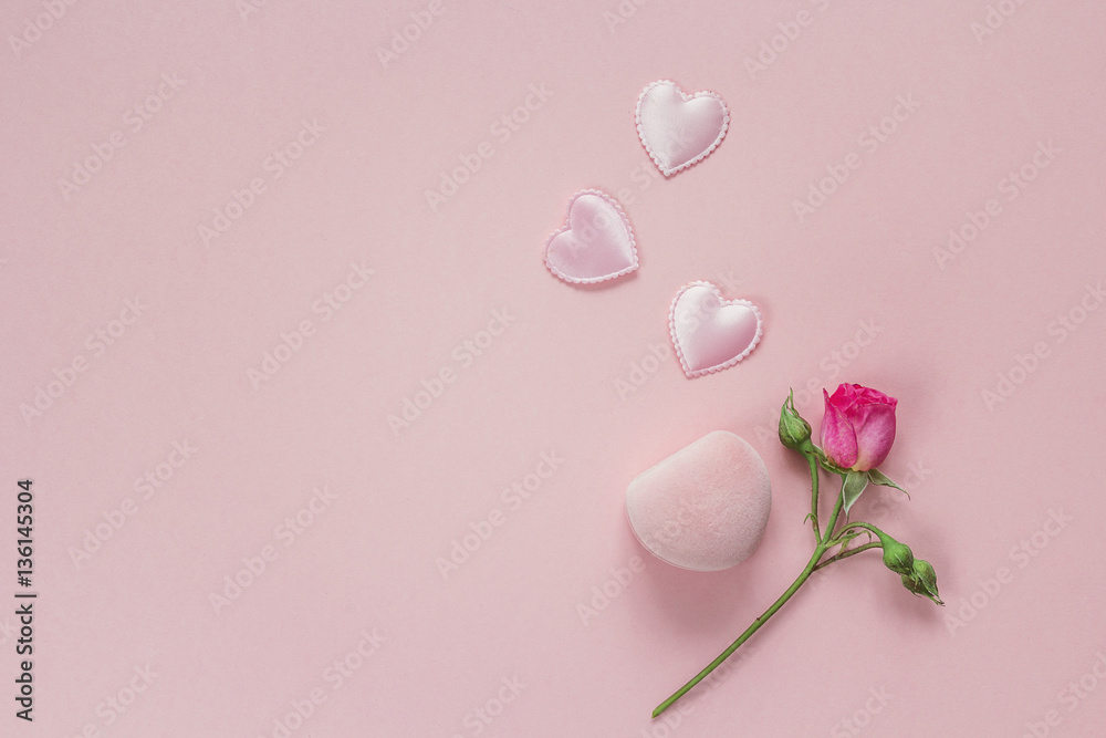 Little rose, gift box and hearts on a pink background. Space for Little rose, gift box and hearts on a pink background. Space for