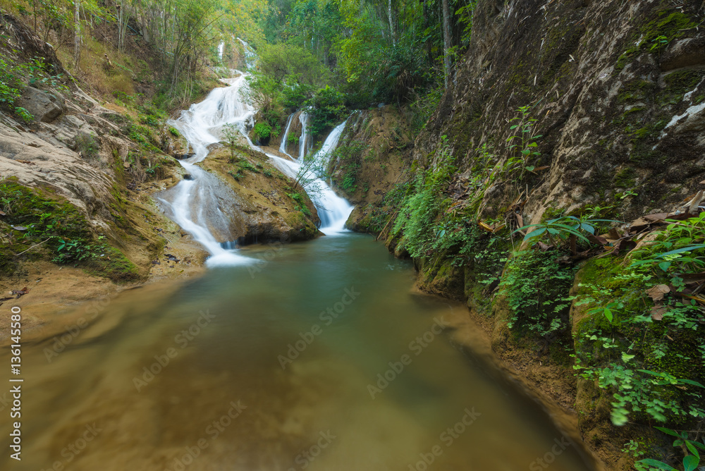 Wang Kaew Waterfall is one of the most beautiful waterfall in Lampang province of Thailand. Caused by the deposition of limestone in the water. There are about 7-8 tiers. Wang Kaew Waterfall is one of the most beautiful waterfall in Lampang province of Thailand. Caused by the deposition of limestone in the water. There are about 7-8 tiers.