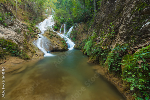 Wang Kaew Waterfall is one of the most beautiful waterfall in Lampang province of Thailand. Caused by the deposition of limestone in the water. There are about 7-8 tiers.