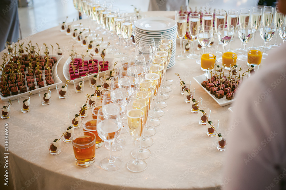 BANQUET beautifully served table with a variety of snacks and drinks