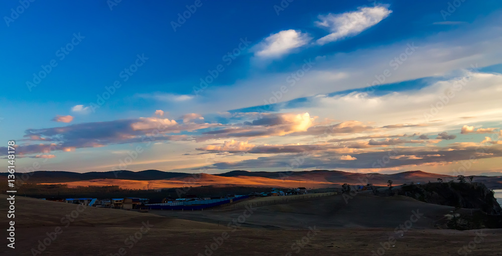 Hills Olkhon in a colorful sunset over the Khuzhir