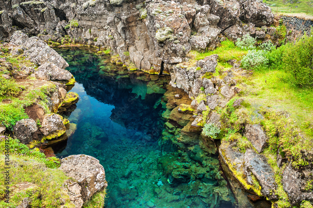 Cliffs and deep fissure in Thingvellir National Park, Iceland