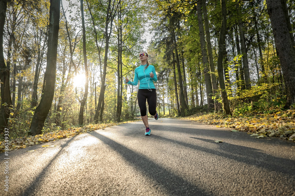 Fototapeta premium Runner in action at autumn.