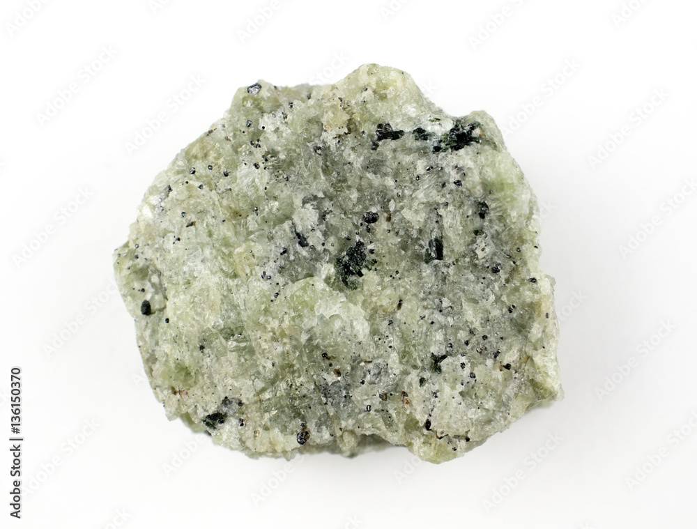 Raw peridot on white background. Raw peridot on white background.