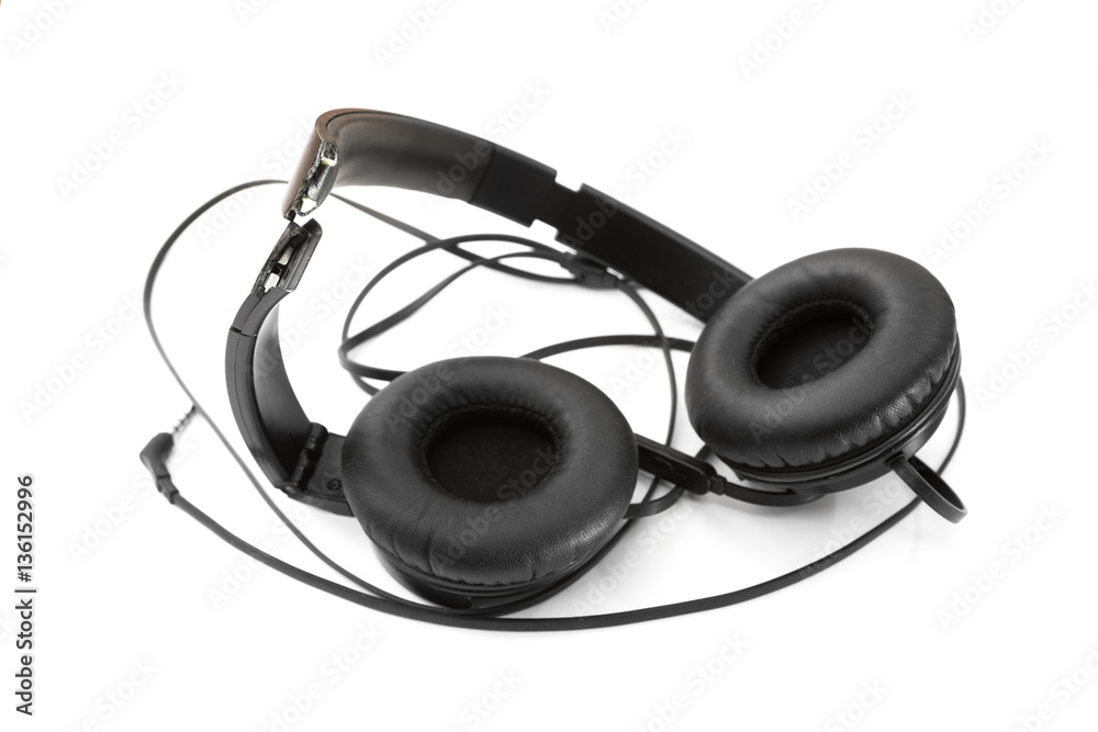 Fototapeta premium Broken headphones on white isolated background