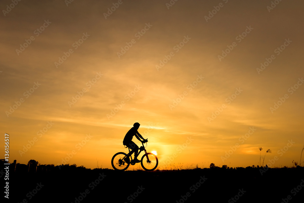 Silhouette of cycling on sunset background Silhouette of cycling on sunset background