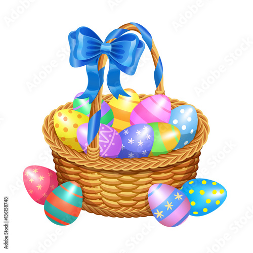 Easter basket with color painted easter eggs isolated on white