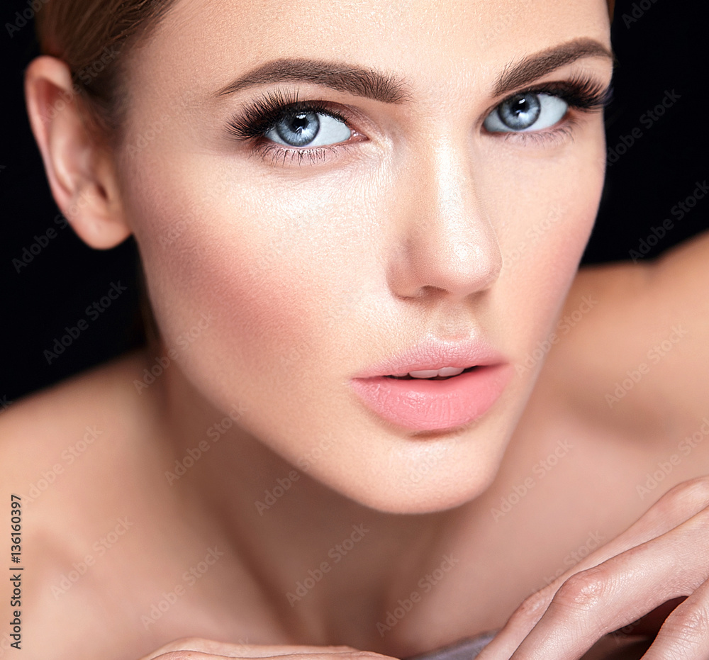 beautiful woman model with no makeup and clean healthy skin face on black background beautiful woman model with no makeup and clean healthy skin face on black background