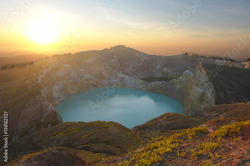 Kelimutu crater at sunrise - volcano, close to the town of Moni in central Flores island in Indonesia